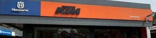 KTM Karunagappally (Sarathy Bikes Pvt Ltd) cover logo
